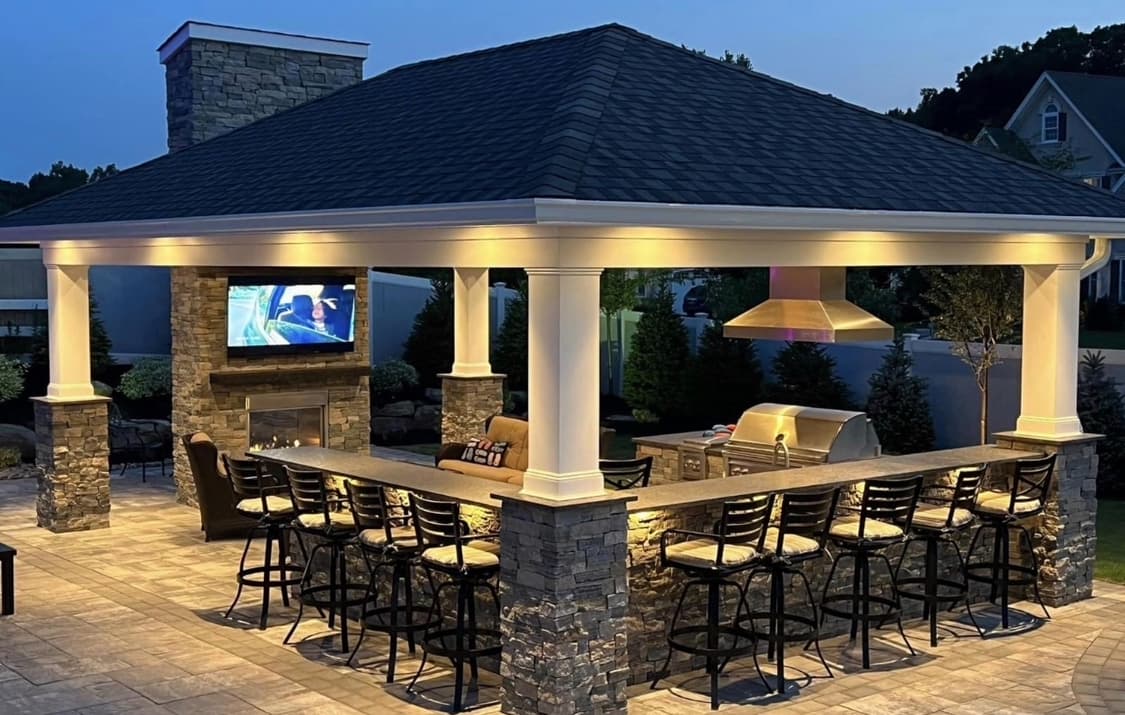 Swim-up seating and bar area integrated into a poolside entertainment layout.