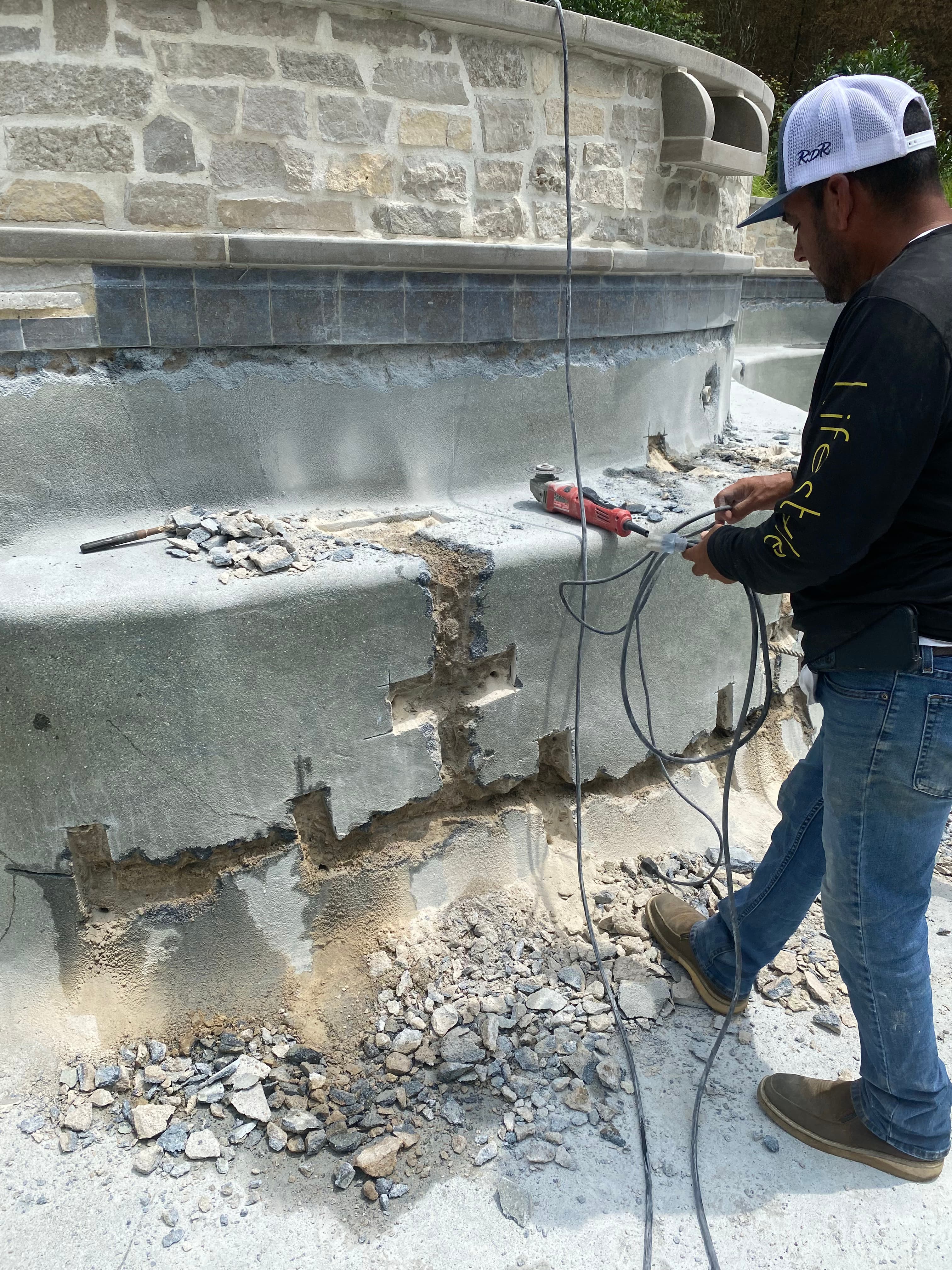 Resort-style pool with natural stone surround.