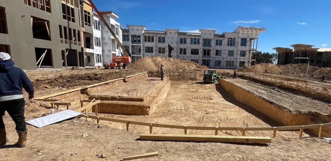 Commercial pool renovation with updated finish, tile, and coping.