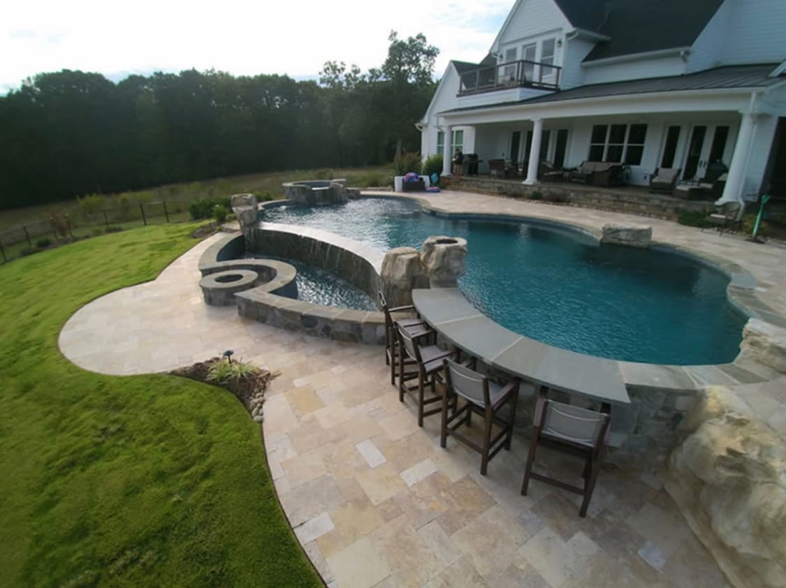 Custom coping and masonry finish detail.