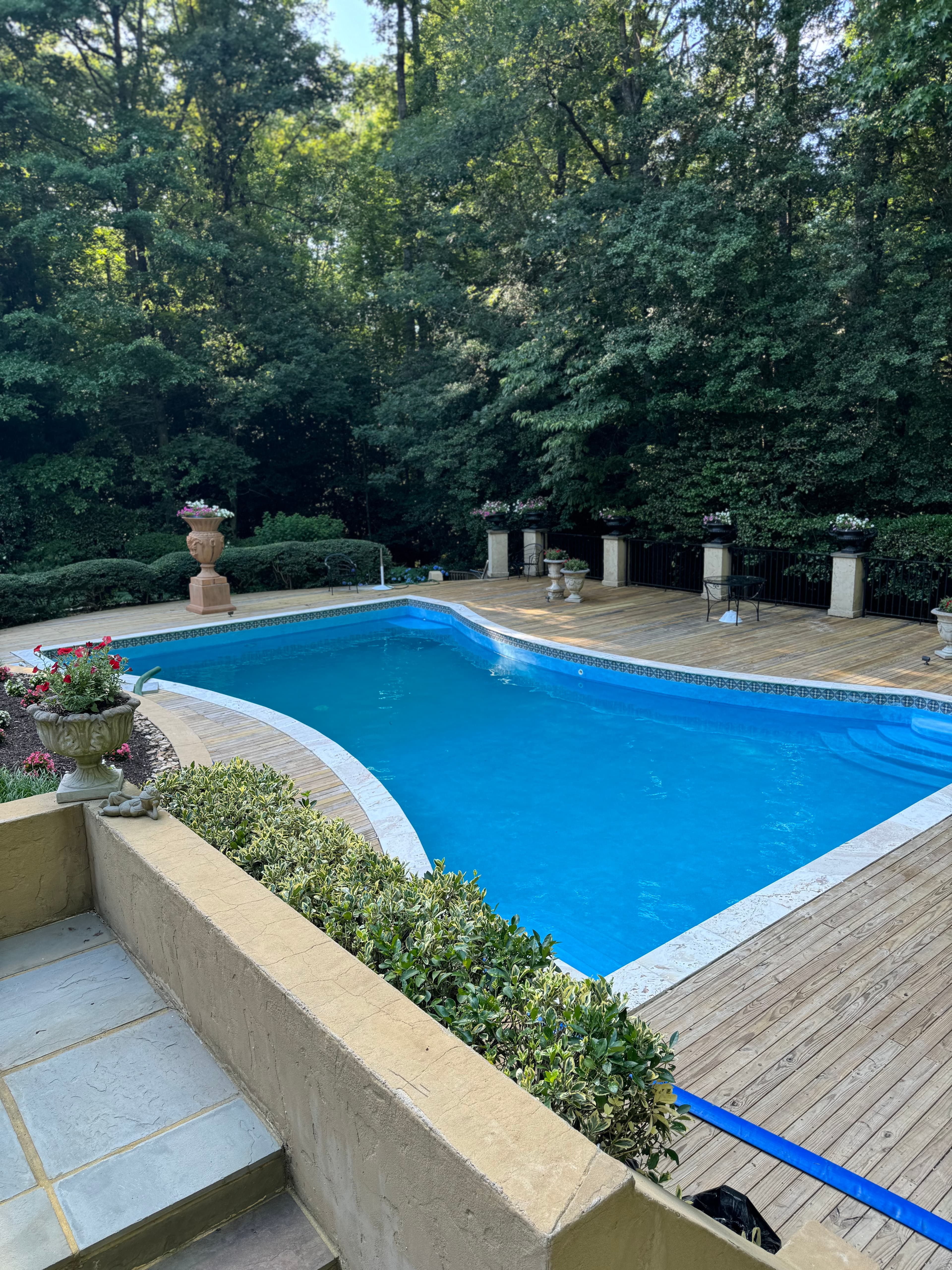 Custom pool and premium hardscape designed for relaxed backyard living.