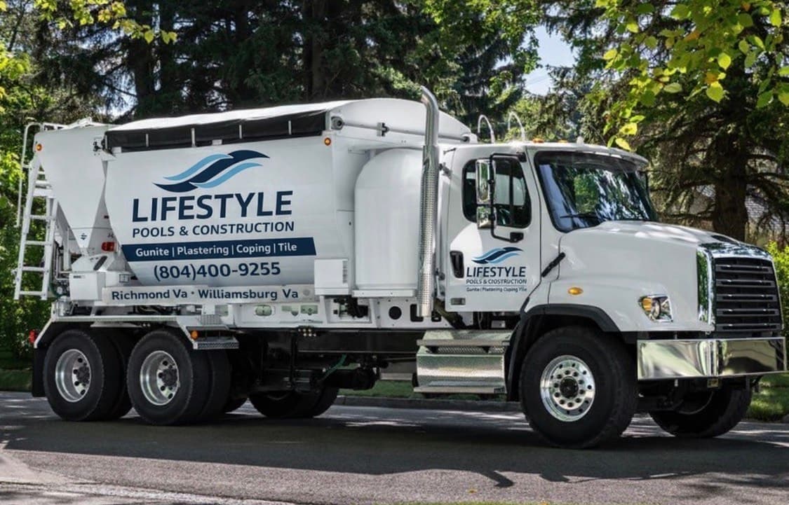 Lifestyle Pools & Construction gunite mixer truck on site.