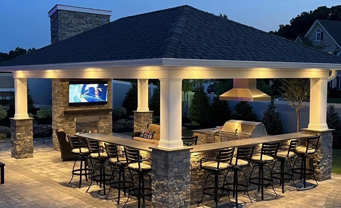 Completed pool project with outdoor living and hardscape.